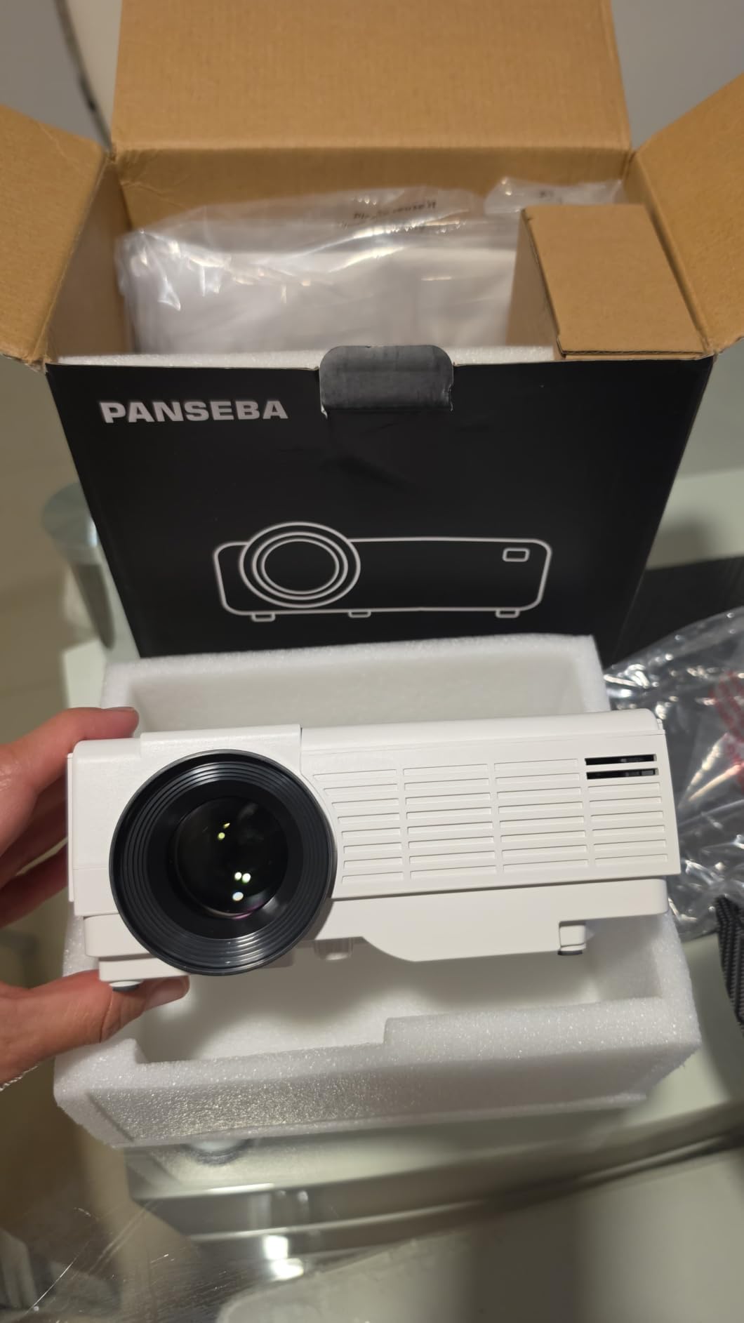 PANSEBA 1080P Mini Projector with Screen, Portable Home Theater Movie Projector with Two-Way Bluetooth, HDMI/USB Input for Smartphone/TV Stick, Ideal for Indoor & Outdoor Use, White customer photo 2