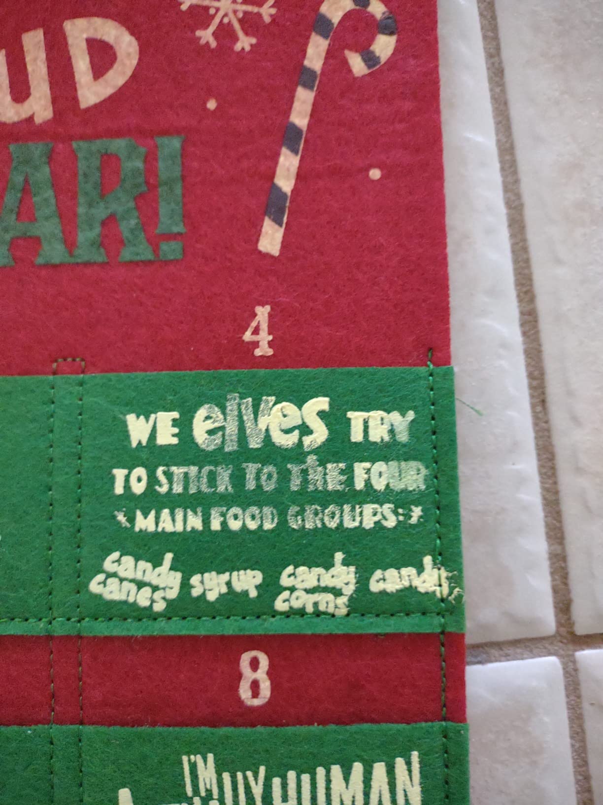 Buddy the Elf Fabric Advent Calendar, Movie Merchandise | 24 Pockets with Movie Icons & Quotes, Includes Mini Buddy Figure customer photo 1