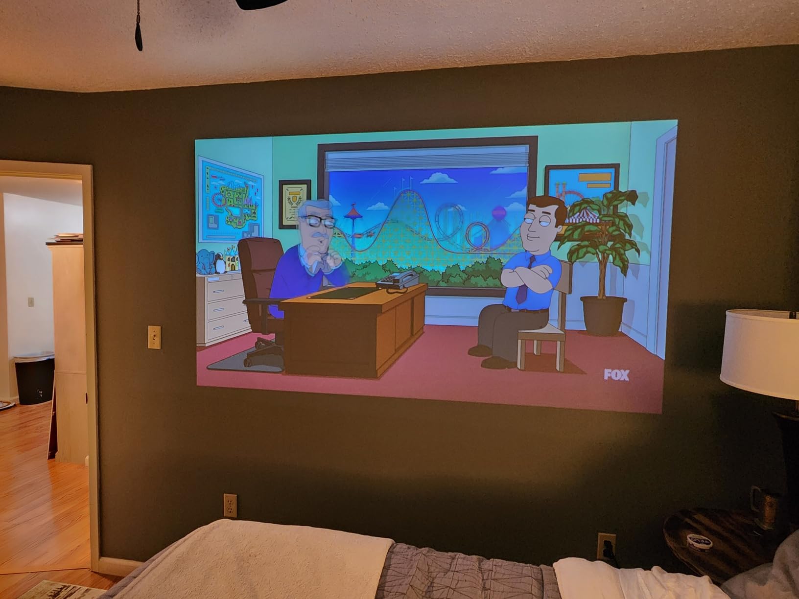 XGIMI Elfin Flip Plus Portable Projector, Google TV with Licensed Netflix, 500 ISO Lumens, 1080P Resolution Home Projector, Build-in Adjustable Stand, Lightweight and Compact Design, Screen Adaption | Google TV with Licensed Netflix, 1080P Resolution Home Projector, Lightweight and Compact Design, Screen Adaption customer photo 2