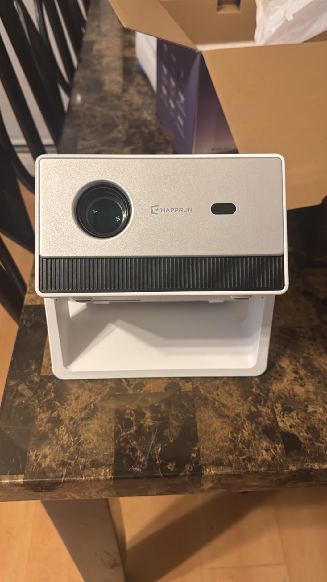 HAPPRUN 1500 ANSI 4K Decoding Outdoor Projector with Built-in Streaming App, WiFi and Bluetooth, 270° Stand, Dolby Audio for Indoor & Outdoor Movies customer photo 1