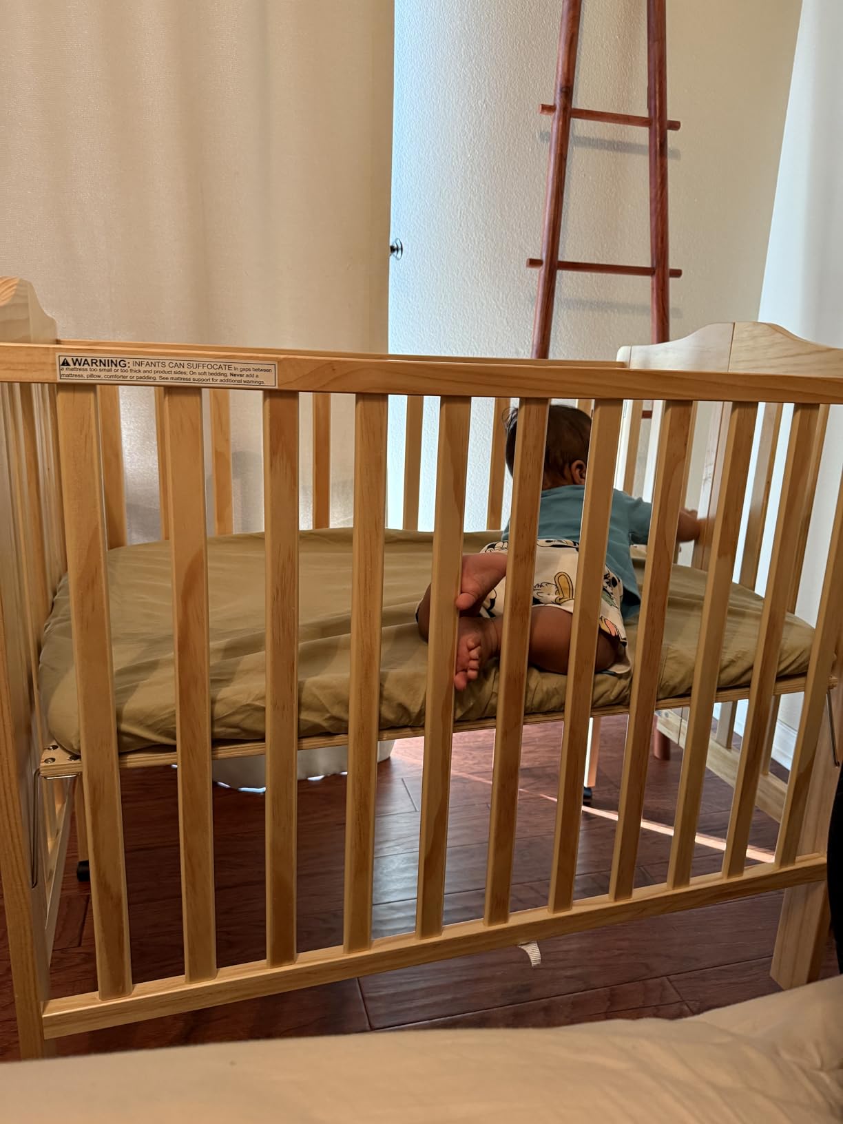 Delta Children Folding Portable Mini Baby Crib with 1.5-inch Mattress - Greenguard Gold Certified, White customer photo 1